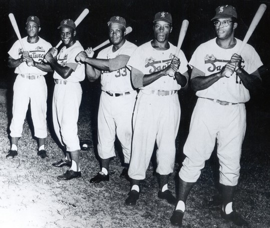 From left to right: Willie Mays, Roberto Clemente, Buzz Clarkson, Bob Thurman and George Crowe. Not a bad lineup.